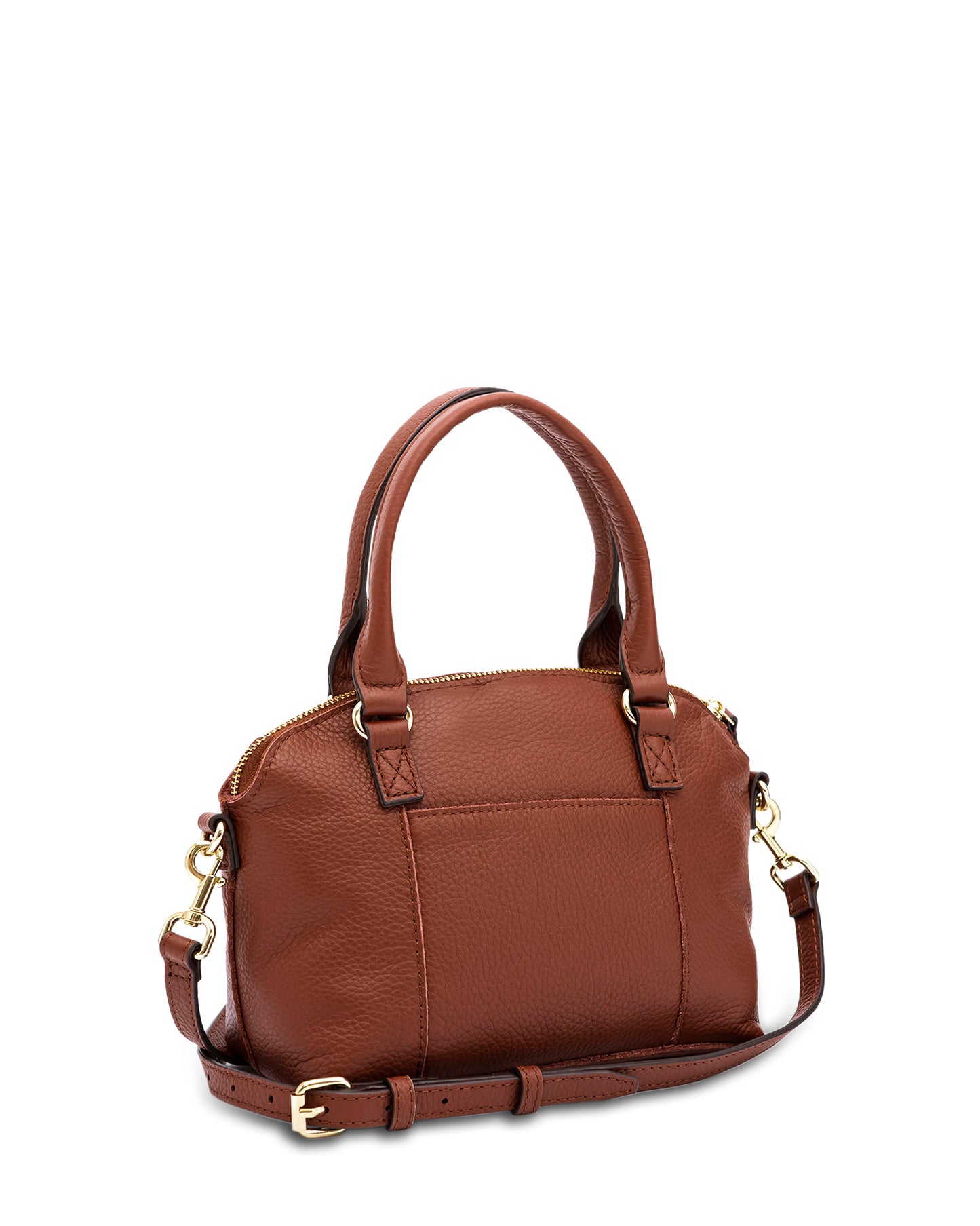 The Carrie Mini Dome Crossbody from American Leather Co. is a stylish, brown leather handbag with gold-tone hardware, featuring two short handles and a detachable crossbody strap. Made from genuine leather, it includes a zipper closure on top and a flat base. One side boasts a simple, unadorned pocket, enhancing its minimalistic design.