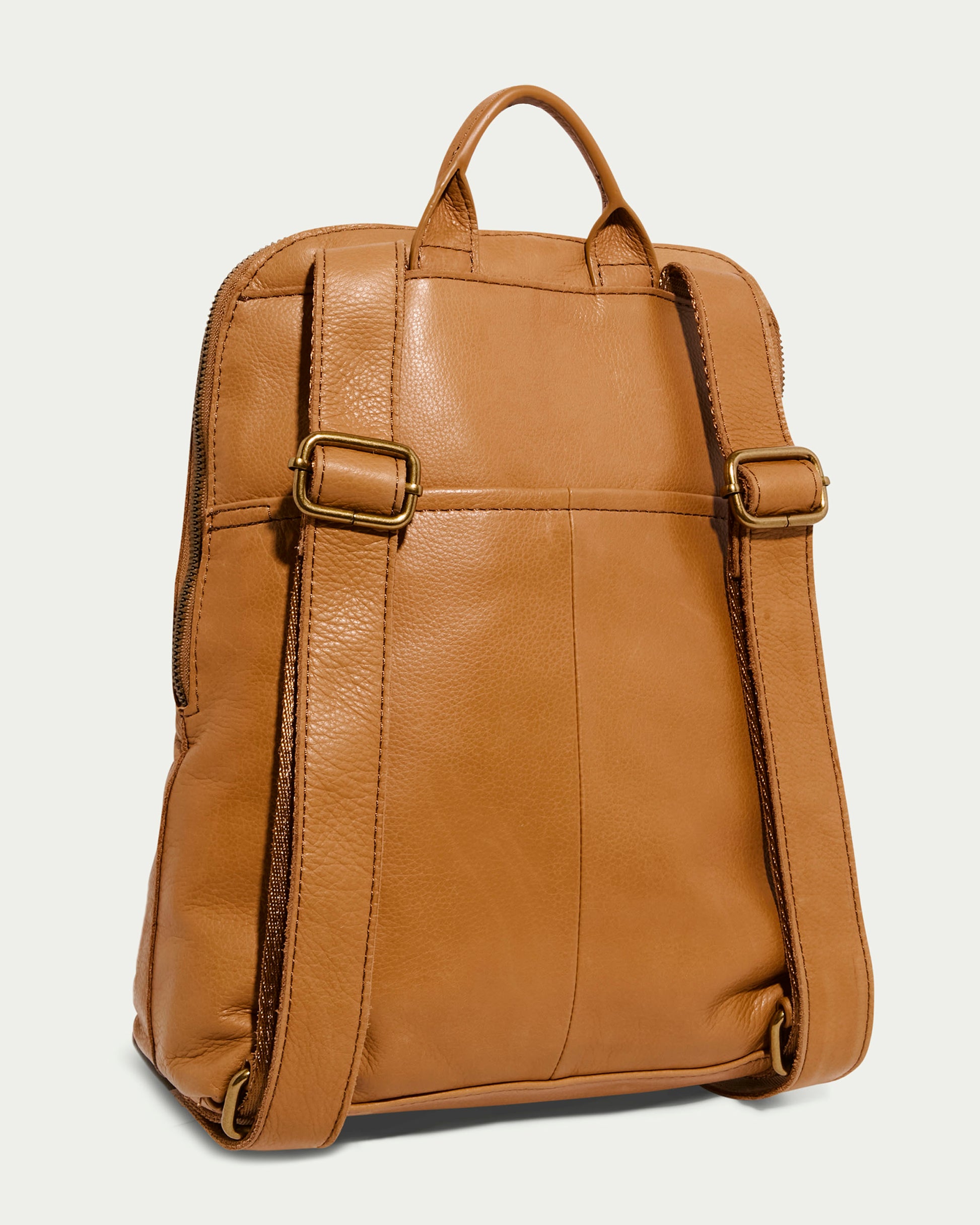 The Cleveland Backpack by American Leather Co. is a women's leather backpack made from genuine American leather, featuring adjustable straps, a carrying handle, textured surface, and visible stitching for a sleek and functional design perfect for everyday use.