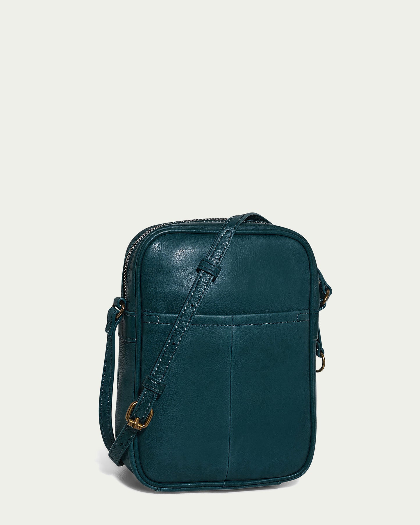 The Cleveland Large NS Crossbody by American Leather Co. is a structured dark green leather bag with a front pocket, adjustable strap, and metallic accents. Made from Genuine American Leather, it's displayed on a light background for a classic look.