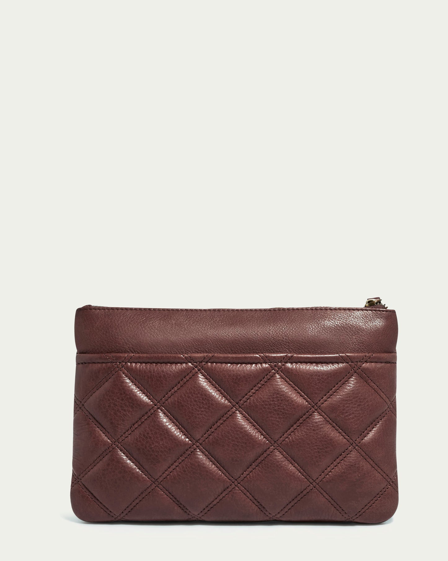 The Emerson Quilted Wristlet by American Leather Co. is a brown leather clutch with a diamond pattern and gold top zipper, set against a plain light background.