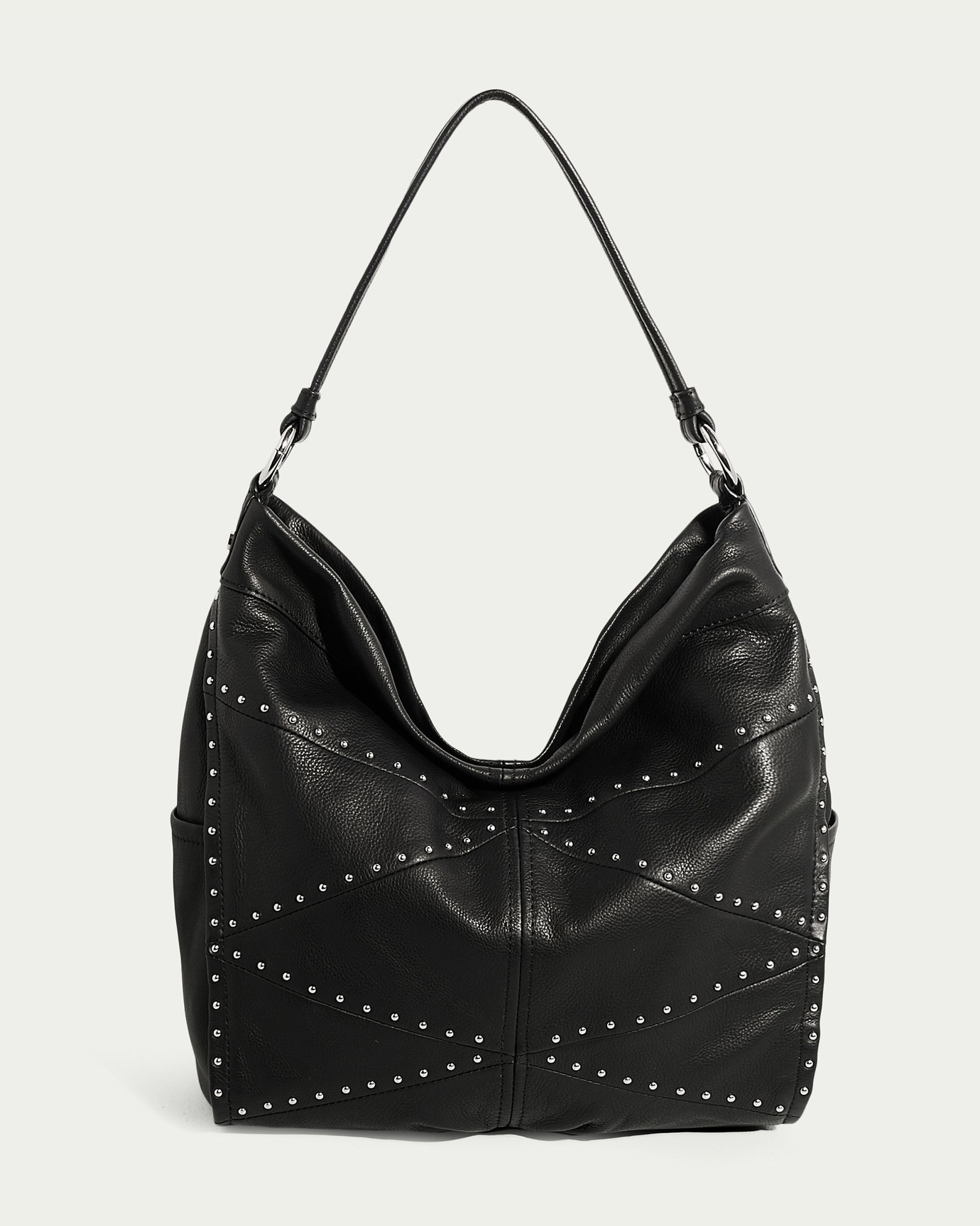 The Locke Ziptop Studded Hobo by American Leather Co. is a black genuine leather shoulder bag with a single strap. It showcases a pattern of diagonal and vertical stitching, accentuated by fashionable stud detailing. The overall design is sleek and modern.