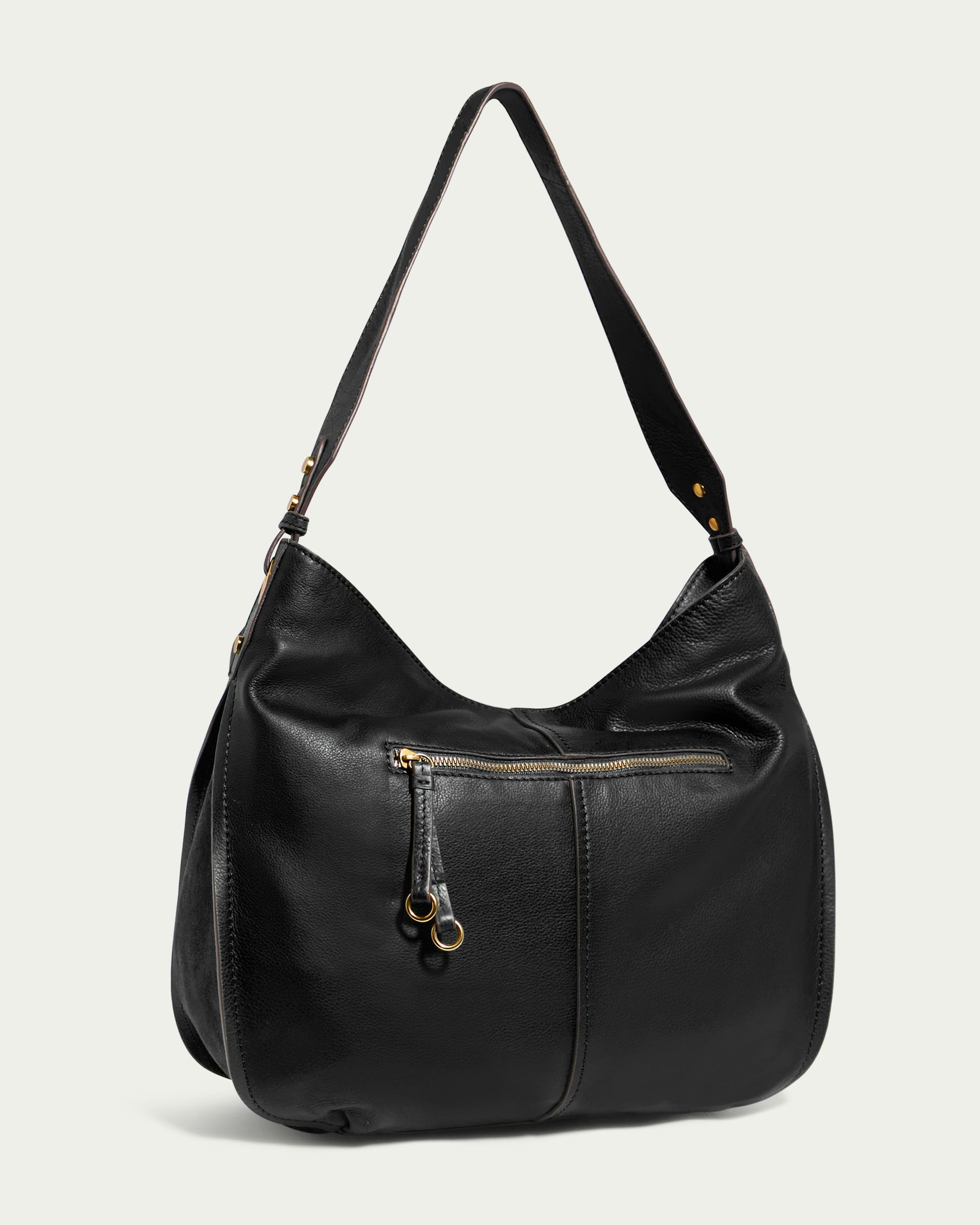 The Summit Large Top Zip Hobo by American Leather Co. is a sleek black leather shoulder bag with a single strap and gold-tone hardware. It features a front zip pocket adorned with round zipper pulls and a spacious, zippered main compartment. The design is minimalist and elegant.