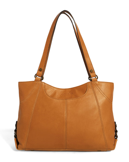 Introducing the Sunrise Shopper by American Leather Co.: a medium-sized tan leather handbag made from Genuine American Leather, featuring dual handles with stitching details, metal accents, and a slightly curved top for structured style and practicality.