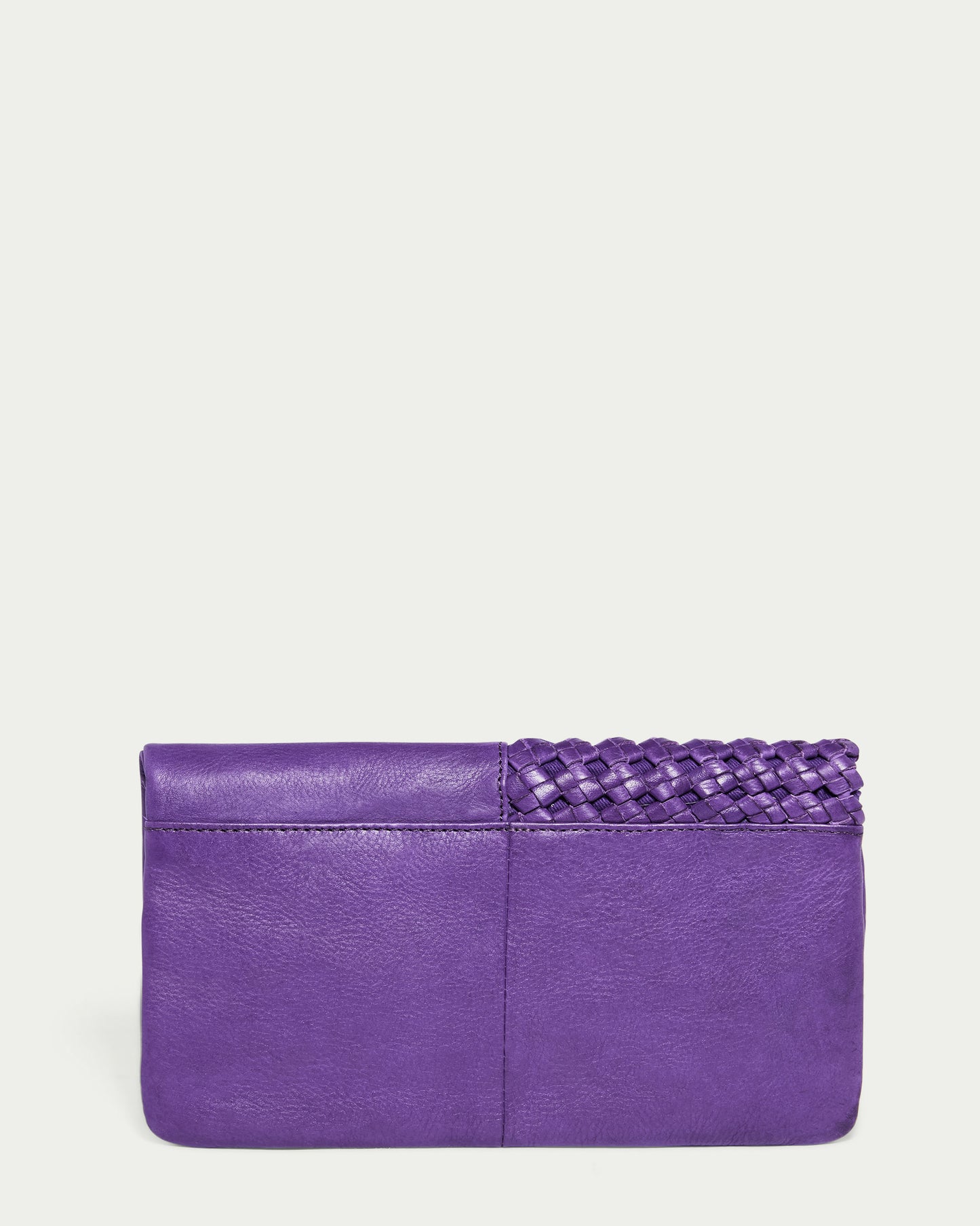 A purple Webster Woven Bifold Wallet by American Leather Co., showcasing intricate woven details on the top right corner against a light gray background.