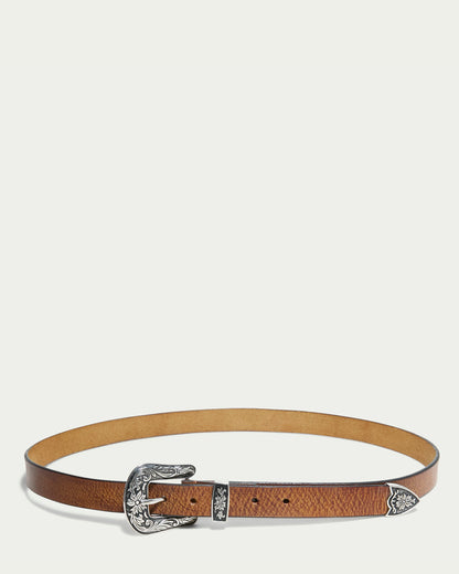 Wardrobe essential Hamilton Belt by American Leather Co. features ornate silver hardware with intricate floral engravings on its buckle and tip, elegantly presented against a plain white background.