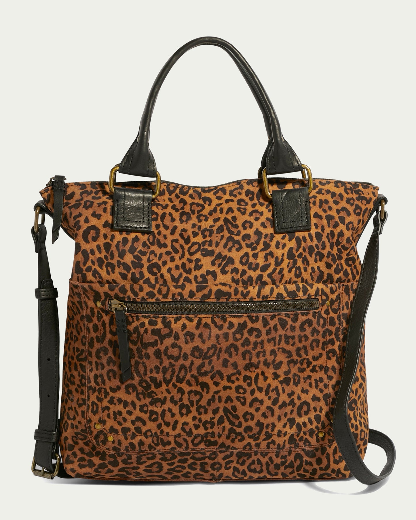 The Jamestown Tote by American Leather Co. is a stylish, large handbag with a leopard print design and black leather accents. It features two sturdy black handles, an adjustable shoulder strap, and a front zipper pocket with a black zipper pull. Made with Genuine American Leather, the background color is light green.