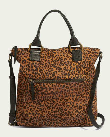 The Jamestown Tote by American Leather Co. is a stylish, large handbag with a leopard print design and black leather accents. It features two sturdy black handles, an adjustable shoulder strap, and a front zipper pocket with a black zipper pull. Made with Genuine American Leather, the background color is light green.