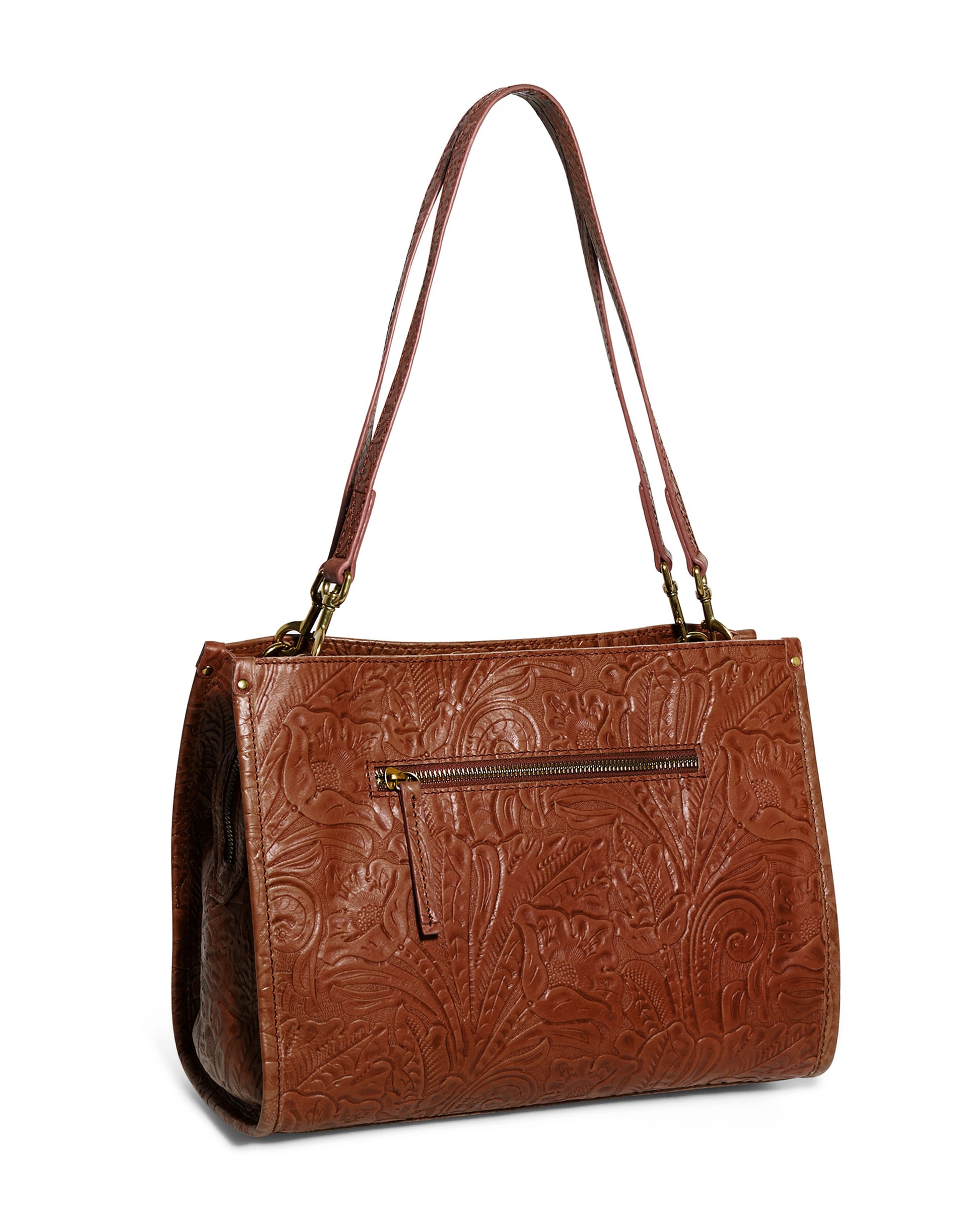 The Lenox Triple Entry Satchel by American Leather Co. is a brown leather bag made from authentic American leather, showcasing detailed floral embossing. It includes a front zippered pocket and two durable leather shoulder straps, making it perfect for daily use.