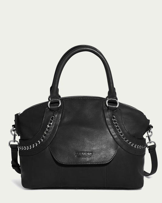 The Janssen Dome Satchel by American Leather Co. is a sleek and elegant black leather dome satchel with dual handles and silver chain accents. This versatile everyday bag features a zippered top, side rings for an optional strap, and a logo on the front, making it suitable for various occasions.