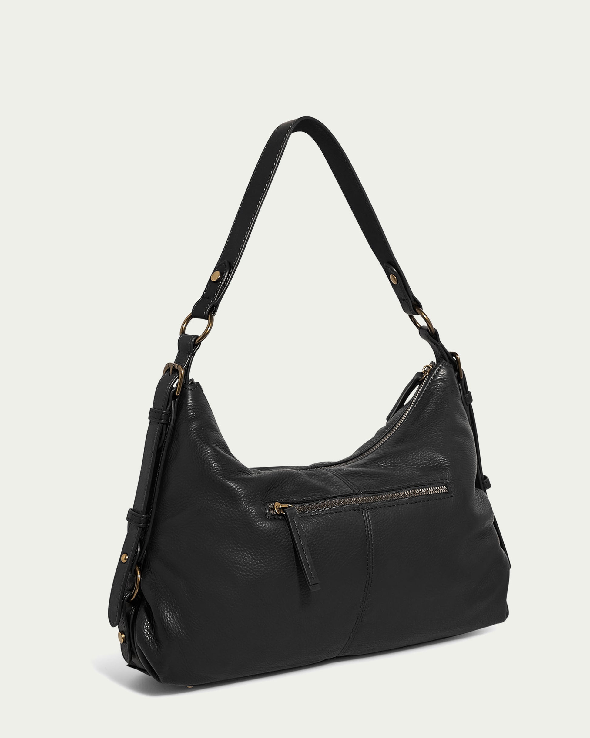 Introducing the Thayer Perfect Hobo by American Leather Co., a stylish shoulder bag crafted from genuine black leather. Featuring a slouchy design, gold-tone hardware, a front zip pocket, and an adjustable strap, this versatile purse is perfect for both casual and formal settings against a plain light-colored background.