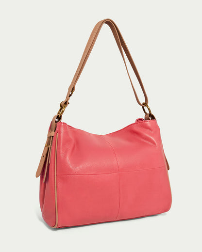 The Dean Double Entry Convertible Hobo by American Leather Co. is a pink glove leather handbag with a structured design, adjustable brown strap, gold hardware, and visible front stitching, elegantly showcased on a plain background.