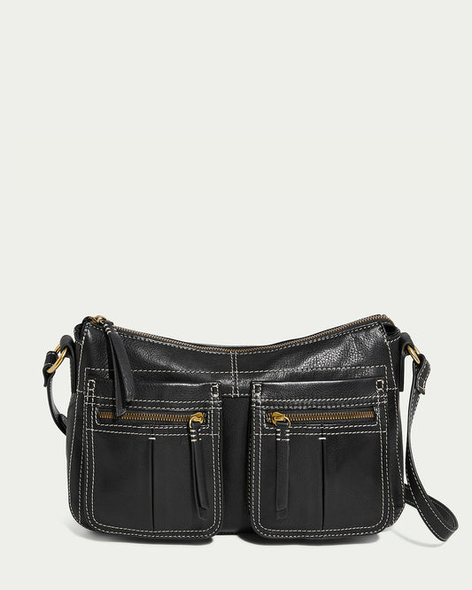 The American Leather Co. Holton Crossbody in black features glove leather, two front zippered pockets with white stitching, an adjustable shoulder strap, and gold-tone hardware, set against a plain light background.