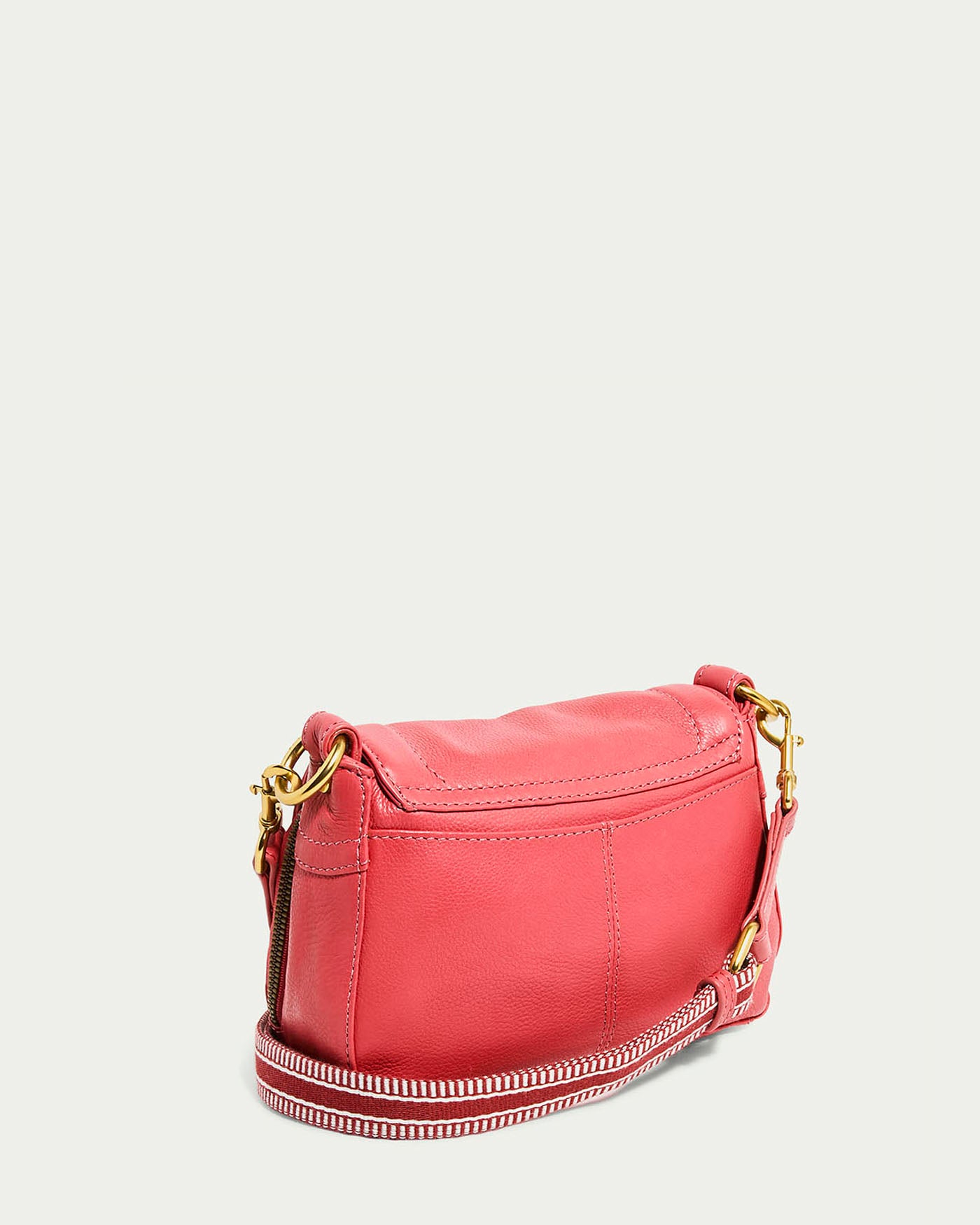 The Marino Mini Crossbody from American Leather Co. is a chic small red glove leather handbag with gold-tone hardware, a red and white adjustable strap, and photographed against a plain white background.