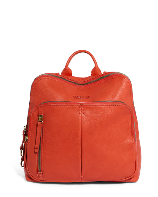 The Cleveland Midsize Backpack by American Leather Co. is a vibrant orange genuine leather backpack featuring a top handle, two zippered compartments, and an extra pocket in the front zip compartment with gold-tone hardware.