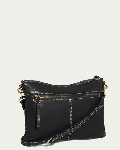 This Mercer Woven Convertible Clutch from American Leather Co. is a black crossbody bag featuring white stitching details and a zippered front pocket, complete with a detachable strap and elegant gold-tone hardware, set against a light gray background.