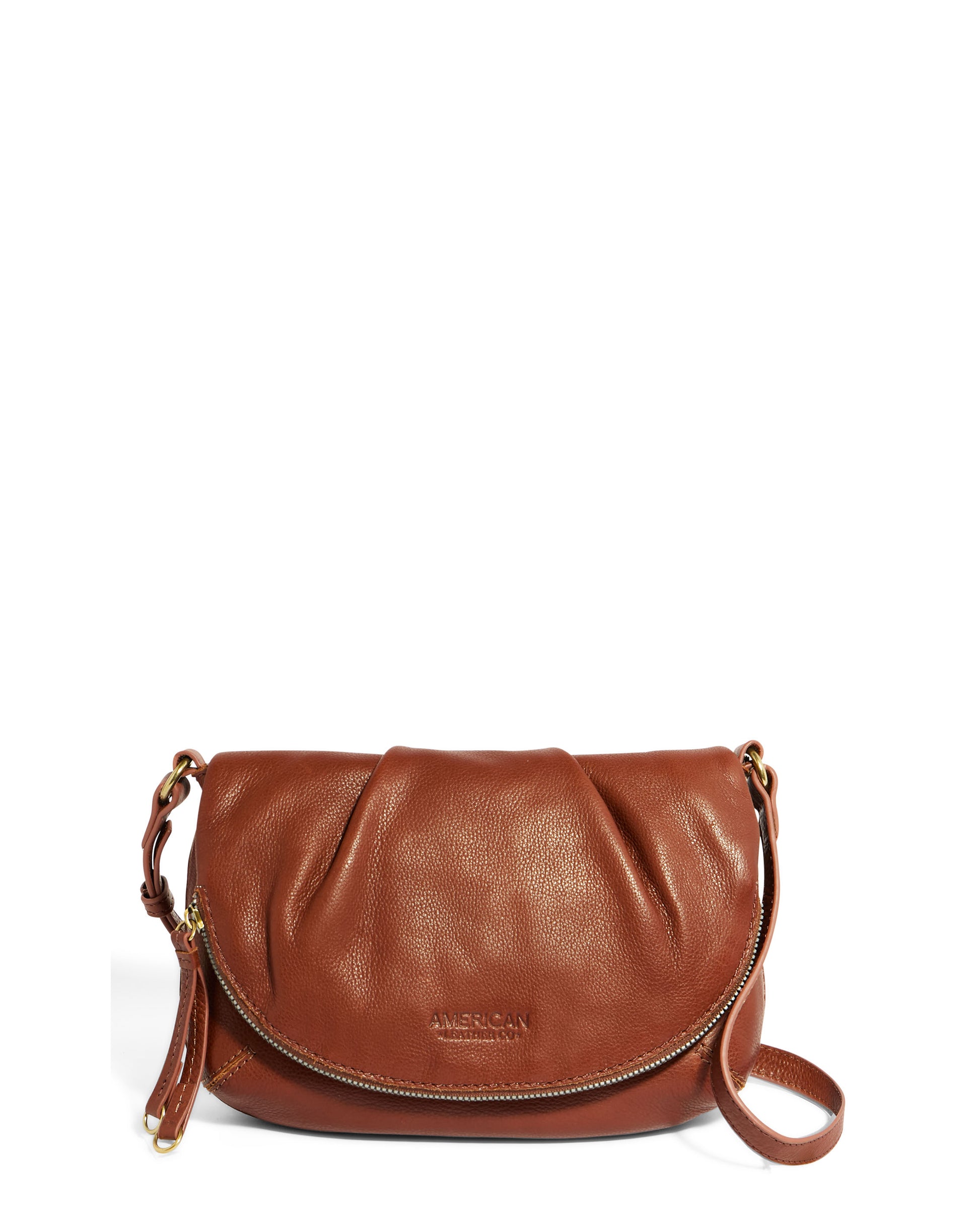 The Talya Double Entry Crossbody by American Leather Co. is an elegant brown leather accessory with a smooth finish, featuring a curved top flap and subtle pleats. This stylish crossbody bag includes a zippered compartment along the bottom and a thin adjustable strap for comfort. The brand "American Leather Co." is subtly debossed on the front, emphasizing its genuine leather quality.