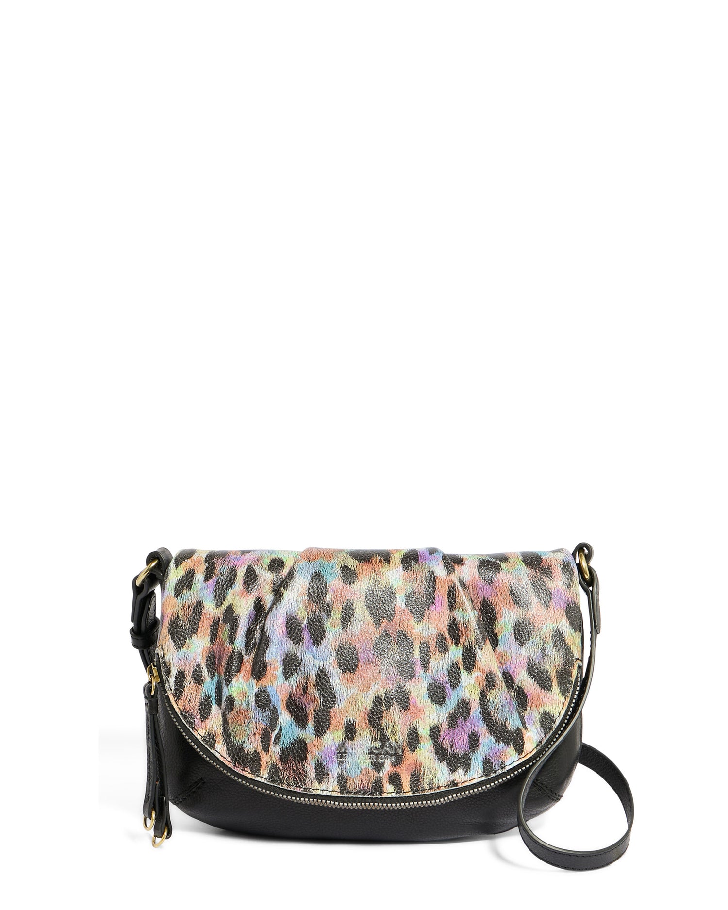 The Talya Double Entry Crossbody from American Leather Co. is a stylish bag featuring a multicolored leopard print flap, a genuine leather black body, and an adjustable black strap with gold-toned hardware. It includes a zipper pocket at the bottom and a tassel attached to the strap.