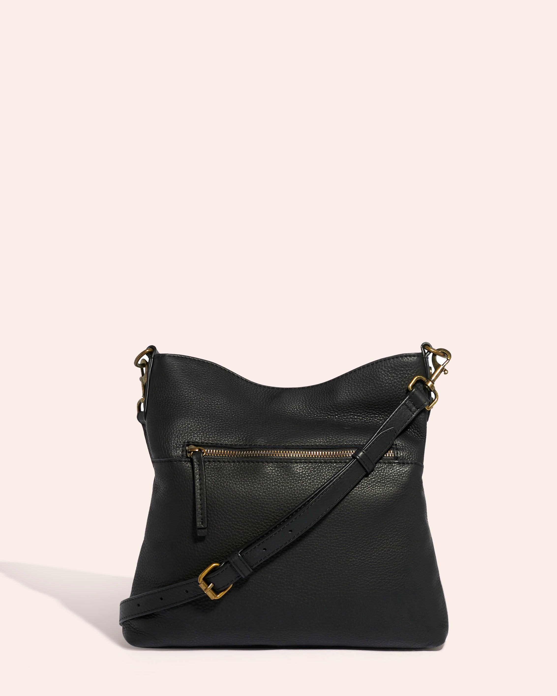 https://www.americanleatherco.com/cdn/shop/products/sp22-virginia-feed-crossbody-black_6_0929fc55-6679-4a1c-833b-d47bbc6b4c3e.jpg?v=1647375899